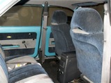 Rear seating and shoulder belts