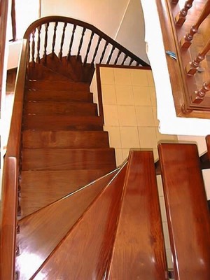 wooden steps to third floor